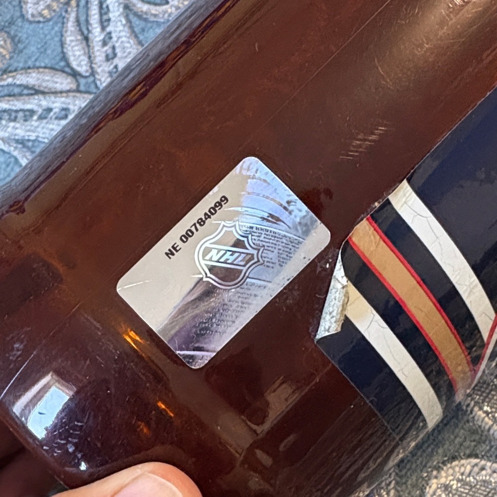 NHL Edmonton Oilers Brown Bottle with Gold Cap Coin Bank - Picture 2 of 7